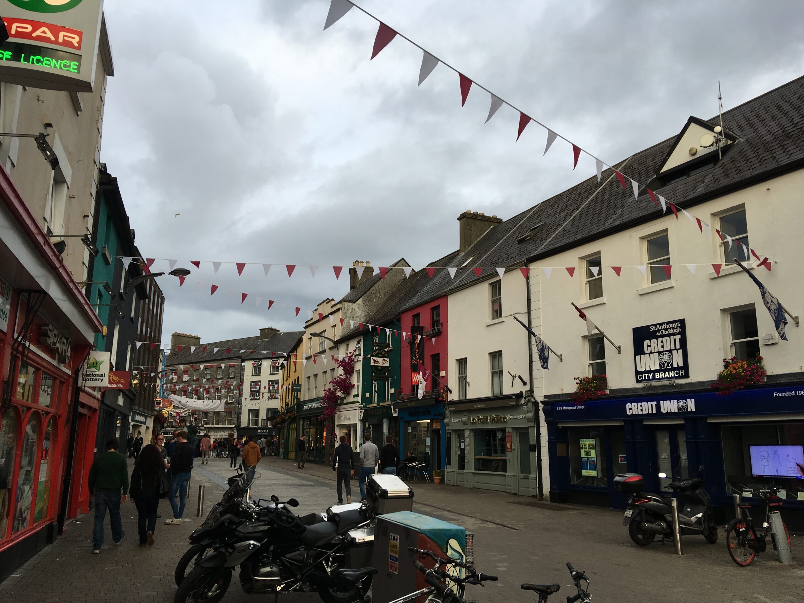 Alley of Ireland street with muted yellow exteriors